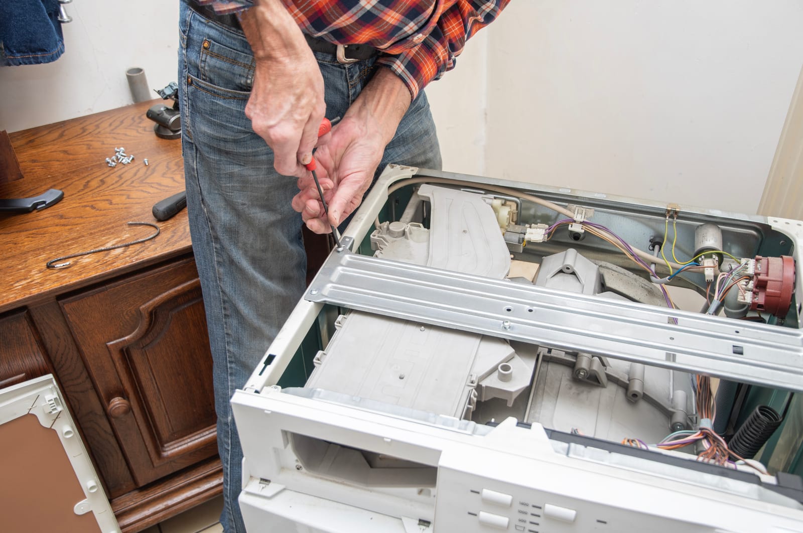 Technician installing a washing machine